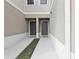 Charming townhome with a well-kept front entrance and dual doorways at 255 Blueberry Ln, Davenport, FL 33837