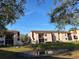Multi-Gathering residential complex with landscaped lawns and mature shade trees at 2562 Lakeway Branch Way # 3002, Orlando, FL 32839