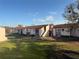 Charming condo community with well-maintained lawns and private balconies under a blue sky at 2562 Lakeway Branch Way # 3002, Orlando, FL 32839