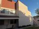 Exterior view of building with stairs and window under a partly cloudy sky at 2562 Lakeway Branch Way # 3002, Orlando, FL 32839