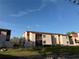 Well-maintained condo building featuring private balconies and lush landscaping at 2562 Lakeway Branch Way # 3002, Orlando, FL 32839