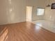 Spacious living room with tile and hardwood flooring with neutral paint at 2562 Lakeway Branch Way # 3002, Orlando, FL 32839