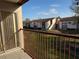 Balcony view of multi-Gathering residential complex with green space on a sunny day at 2562 Lakeway Branch Way # 3002, Orlando, FL 32839