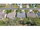 Aerial view of home showcasing roof, landscaping, and neighborhood at 2738 Privada Dr, The Villages, FL 32162