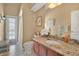 Well-lit bathroom features granite counters, oval sink and shower at 2746 Park Royal Dr, Windermere, FL 34786
