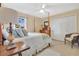 Inviting bedroom with four-poster bed, soft lighting, and ample closet space at 2746 Park Royal Dr, Windermere, FL 34786