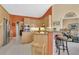 Well-equipped kitchen features stainless steel appliances, granite countertops, and a breakfast bar at 2746 Park Royal Dr, Windermere, FL 34786