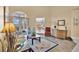 Inviting living area with tile floors and natural light streaming through the large window at 2746 Park Royal Dr, Windermere, FL 34786