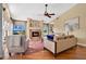 Cozy living room showcasing a fireplace, hardwood floors, and comfortable seating at 2746 Park Royal Dr, Windermere, FL 34786
