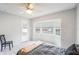 This bedroom features a large bay window, neutral walls, and tiled floor at 3011 George Mason Ave # 3, Winter Park, FL 32792