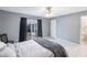 A cozy bedroom features a sliding glass door with access to the backyard at 3011 George Mason Ave # 3, Winter Park, FL 32792