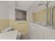 Accessible walk-in tub with shower head in a light-filled bathroom at 30713 George Dr, Tavares, FL 32778