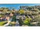 Aerial view of home showcasing lot lines and nearby lake at 3130 Bulkley Pl, Eustis, FL 32726