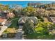 Aerial view of home with the lake in the background at 3130 Bulkley Pl, Eustis, FL 32726