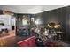 Unique music room features a drum set, bar and cool wall art at 3130 Bulkley Pl, Eustis, FL 32726