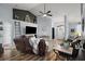 Spacious living room with vaulted ceilings, stylish decor, and plenty of natural light at 3130 Bulkley Pl, Eustis, FL 32726