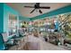 Enclosed patio with view of backyard and patio furniture at 3130 Bulkley Pl, Eustis, FL 32726