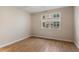 Bedroom features a big window and tiled flooring at 3368 Parkchester Square Blvd # 104, Orlando, FL 32835
