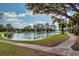 Beautiful lake view with walking path and fountain creating a tranquil environment at 3368 Parkchester Square Blvd # 104, Orlando, FL 32835