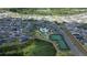 Aerial view of a beautiful community featuring pool, tennis courts, and many well-maintained homes at 3390 Melissa Ln, The Villages, FL 32163