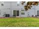 Backyard view featuring well kept lawn at 384 Coral Beach Cir, Casselberry, FL 32707