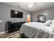 Bedroom featuring a bed, dresser, and stylish wood-look flooring at 384 Coral Beach Cir, Casselberry, FL 32707