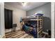 This bedroom features a unique bunk bed with a fun, colorful design at 384 Coral Beach Cir, Casselberry, FL 32707