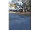 Quaint home featuring a screened porch and charming playhouse at 43648 S Island Dr, Paisley, FL 32767