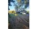 Detached garage with covered parking and a spacious yard at 43648 S Island Dr, Paisley, FL 32767