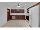Eat in kitchen includes stainless steel appliances and modern ceiling fan at 6213 Highland Ave, Leesburg, FL 34748