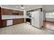 Bright kitchen with ample cabinetry, modern appliances, and open layout at 6213 Highland Ave, Leesburg, FL 34748