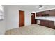 Kitchen featuring tile floors and laminate counter tops at 6213 Highland Ave, Leesburg, FL 34748