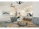 Open-concept living space with dining area, living room, and kitchen, perfect for entertaining at 7163 Jerry Ave, The Villages, FL 34762