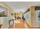 Hallway with hardwood floors, a ceiling fan, and natural light from windows at 720 Camino Del Rey Dr, The Villages, FL 32159