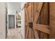 Attractive bathroom sliding barn door at 2600 Robie Ave, Mount Dora, FL 32757