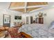 Inviting main bedroom with a wood ceiling, calming colors, and ample natural light at 2600 Robie Ave, Mount Dora, FL 32757