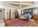 Comfortable main bedroom with a wood ceiling and en suite bathroom, offering privacy at 2600 Robie Ave, Mount Dora, FL 32757