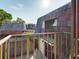 Balcony view of the neighboring roofs on a sunny day at 1009 Royal Oak Blvd, Leesburg, FL 34748