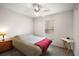 Comfortable bedroom featuring a ceiling fan, a window, and carpet flooring at 109 Pecan Pass, Ocala, FL 34472