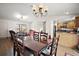 Open dining area connecting to the living room and kitchen, perfect for entertaining at 109 Pecan Pass, Ocala, FL 34472