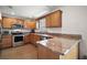 Well-equipped kitchen with stainless steel appliances and granite countertops at 109 Pecan Pass, Ocala, FL 34472