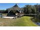 Photo of a gazebo sitting over a lake with ducks at 1127 Belmont Cir, Tavares, FL 32778