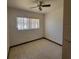 This is a standard bedroom with a window for natural lighting at 115 N Galena Ave, Minneola, FL 34715