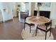 Cozy kitchen nook featuring modern appliances, lots of natural light, and a small dining table at 1391 E Crooked Lake Dr, Eustis, FL 32726