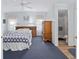 A primary bedroom leading to an ensuite bath at 1501 W Schwartz Blvd, Lady Lake, FL 32159