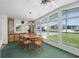 Bright dining area with natural light and cozy furnishings at 1501 W Schwartz Blvd, Lady Lake, FL 32159