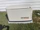 A Generac generator sits outside the house at 1501 W Schwartz Blvd, Lady Lake, FL 32159