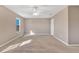Bright, spacious bedroom with neutral tones, carpet, and large windows with lots of natural light at 16707 Broadford Ln, Clermont, FL 34714