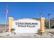 Entrance sign for Citrus Highlands and Citrus Valley communities under a clear blue sky at 16707 Broadford Ln, Clermont, FL 34714