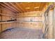 Interior view of the storage shed featuring wood walls, shelves and concrete floor at 16707 Broadford Ln, Clermont, FL 34714